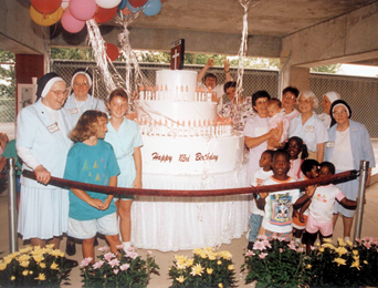 Sister's at birthday cake Sister's at birthday cake